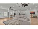 Open-concept living area showcases abundant natural light and seamless flow to the kitchen at 570 Gandhi Dr, Lakeland, FL 33813