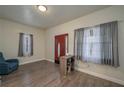 Bright living room with hardwood floors and plenty of natural light at 506 N Wales Dr, Lake Wales, FL 33853