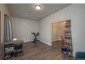 Versatile spare bedroom with laminate wood flooring at 506 N Wales Dr, Lake Wales, FL 33853