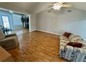 Spacious living room with vaulted ceiling and abundant natural light at 6718 Trail Ridge Dr, Lakeland, FL 33813