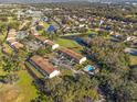 Aerial view of condo community near a pond at 6123 Topher Trl # 63C, Mulberry, FL 33860