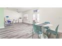 Casual dining area with a round table and four chairs at 185 St Thomas Dr, Mulberry, FL 33860