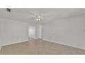 Spacious living room with tile flooring and ceiling fan at 3107 Valley High Dr, Lakeland, FL 33813