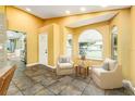 Inviting living room featuring ample natural light and comfortable seating at 4617 S Devon Ave, Lakeland, FL 33813