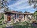Guest house exterior with a walkway and landscaping at 3940 Laurel Branch Dr, Lakeland, FL 33810