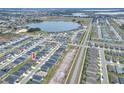 Aerial view showing the location of the house within the community at 1034 Corso Dr, Winter Haven, FL 33884