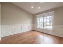 Spacious office with hardwood floors and a large window at 5545 Harrells Nursery Rd, Lakeland, FL 33812