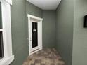 Front entryway with modern door and paver flooring at 161 Laynewade Rd, Polk City, FL 33868