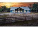 Stunning curb appeal with wooden fence at 3960 Laurel Se Ave, Lakeland, FL 33812