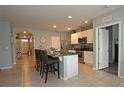 Spacious kitchen with stainless steel appliances and an island at 433 Montego Bay Dr, Mulberry, FL 33860
