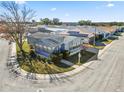 Aerial view of mobile home community showcasing the subject property's location and neighborhood at 2206 Golden Horseshoe N Cir, Lakeland, FL 33810