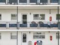 Apartment building balcony with seating and exterior view at 200 El Camino Dr # 309, Winter Haven, FL 33884