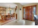 Formal dining room with wooden table and chandelier at 2620 Jonila Ave, Lakeland, FL 33803