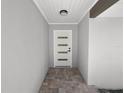 Modern entryway with a clean, minimalist design and tile flooring at 5252 Post Ln, Lakeland, FL 33809