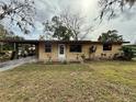 Front view of a renovated ranch home with a covered porch at 122 8Th Se St, Fort Meade, FL 33841