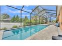 Refreshing screened pool and patio area at 178 Magneta Loop, Auburndale, FL 33823