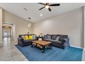 Spacious living room with two sofas, a coffee table, and hardwood floors at 1832 Prima Vista Dr, Lakeland, FL 33810