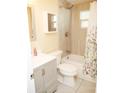 Updated bathroom with a new vanity and a tiled shower/tub combo at 1914 Alexander Dr, Lakeland, FL 33803