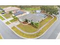 Aerial view showing house, pool, and solar panels at 2105 Normandy Heights Ln, Winter Haven, FL 33880