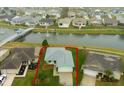 Single-story home, nicely landscaped with water views at 2266 Silver Re Dr, Lakeland, FL 33810