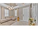 Bright and airy entryway with a stylish seating area at 4003 Solamor St, Lakeland, FL 33810