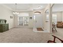 Spacious dining area with ample natural light and carpeted floors at 4308 Whistlewood Cir, Lakeland, FL 33811