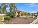 Single-story house with a lush, well-manicured lawn at 6714 Highlands Creek Loop, Lakeland, FL 33813