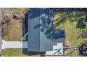 Aerial view showing house layout and backyard patio at 1418 Grace N St, Lakeland, FL 33810