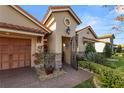 Welcoming entryway with decorative iron gate and brick walkway at 2961 Sanctuary Cir, Lakeland, FL 33803