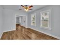 Bright dining room with hardwood floors and neutral walls at 3220 Clubhouse Rd, Lakeland, FL 33812