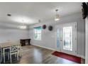 Bright dining area with hardwood floors and a view to the entry at 4185 Shearwater St, Lakeland, FL 33811