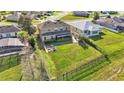 Aerial view showing house, backyard, and surrounding neighborhood at 4512 Brookshire Pl, Lake Wales, FL 33898