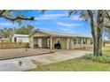 Newly renovated ranch home with covered carport and spacious yard at 9585 Shreck Rd, Bartow, FL 33830