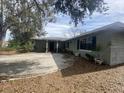 House exterior showcasing the front entrance and landscaping at 3638 W Wheeler Rd, Lakeland, FL 33810