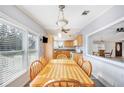 Bright dining area with wood table and chairs at 4938 Deerwood Dr, Lakeland, FL 33810