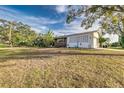 Ranch style home with a large yard and detached garage at 518 Boger N Blvd, Lakeland, FL 33803