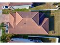 House roof and backyard, seen from above at 1958 Altavista Cir, Lakeland, FL 33810