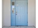 Light-blue front door with a keypad at 2348 Isle Royale Se Ct, Winter Haven, FL 33880
