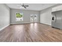 Spacious living area with hardwood floors and french doors at 460 N 1St Ave, Bartow, FL 33830
