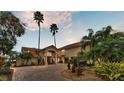 Two-story house with a grand entrance and a beautifully landscaped yard at 5141 Terry Ln, Lakeland, FL 33813