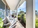 Relaxing front porch with rocking chairs and view of neighborhood at 6127 Magpie Dr, Lakeland, FL 33809