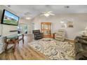 Spacious living room with hardwood floors and ample natural light at 1007 Canary S Cir, Lakeland, FL 33809