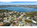 Stunning aerial view of a single Gathering home nestled in a lakeside community at 324 Lake Mariam Blvd, Winter Haven, FL 33884