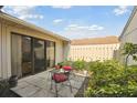 Outdoor patio area with a table and chairs, perfect for relaxation and enjoying the weather at 3901 Oak Loop # 33, Mulberry, FL 33860