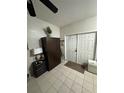 Neutral entryway featuring tile flooring, closet, and a white front door at 389 Nolane Ln, Polk City, FL 33868