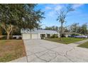 Well maintained single story home with a long driveway leading to an attached two car garage at 4550 Old Colony Rd, Mulberry, FL 33860