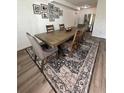 A lovely dining room showcasing a large table and an area rug at 1771 Bayview Dr, Lakeland, FL 33805