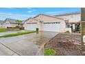 Charming townhome with two-car garage and well-maintained landscaping at 42 Enclave Dr, Winter Haven, FL 33884