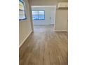 Inviting dining room showcasing updated flooring and access to kitchen and living room at 2007 9Th Ne St, Winter Haven, FL 33881