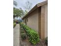 A pleasing exterior view of the building with a well-manicured lawn and tidy landscaping at 320 Eron Way # 6, Winter Garden, FL 34787
